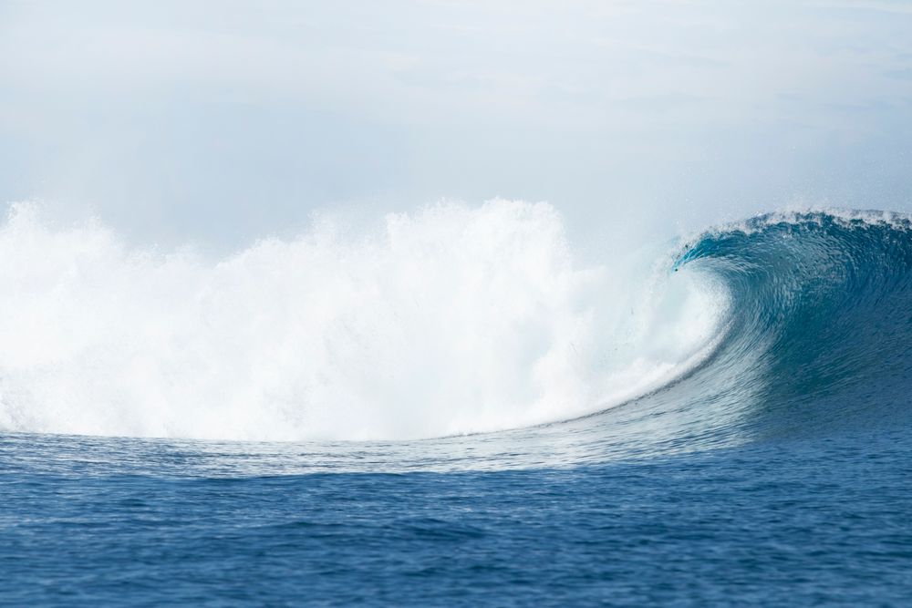 A powerful wave breaking off the coast of Fiji