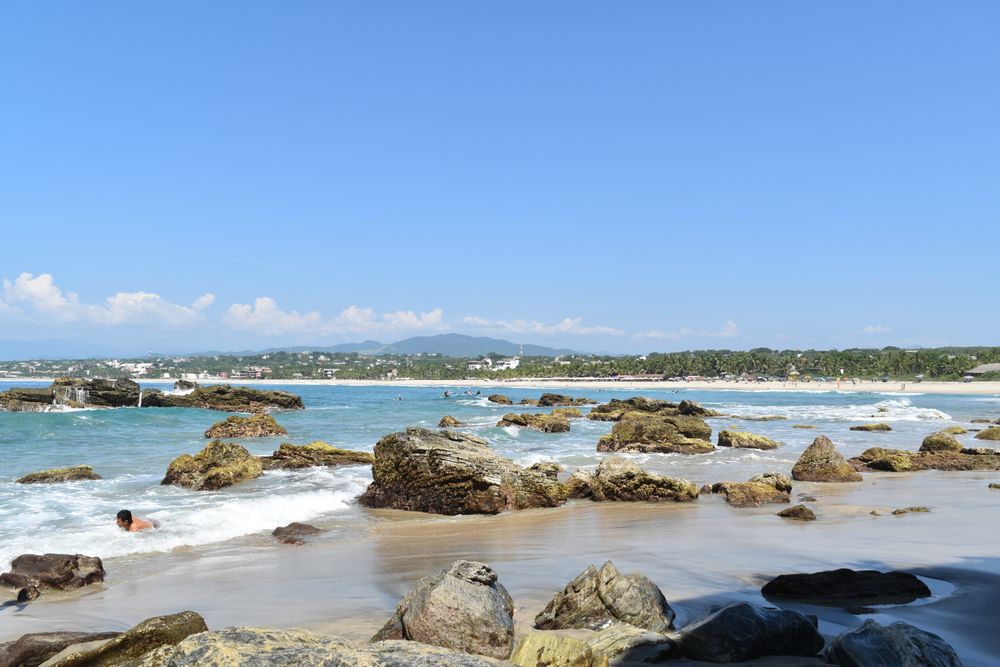 Rocky cove and beach at Puerto Escondido, Oaxaca, Mexico